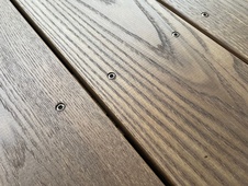 Wurth stainless steel screws in the color of dark wood 